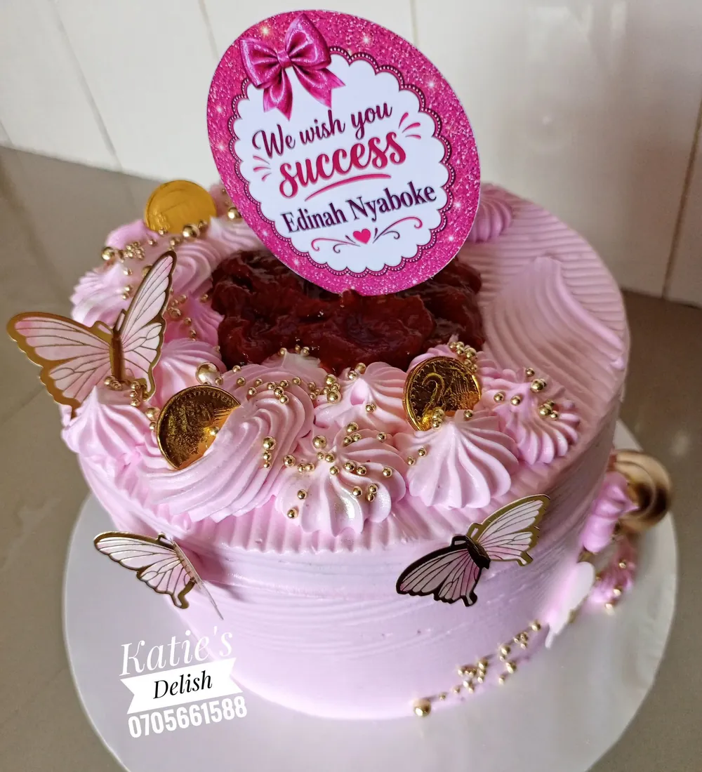 Pink butterfly celebration cake by Katie's Delish