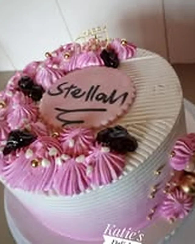 Pink personalised rosette cake